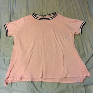 Pink shirt with black and white trim